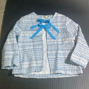 Girls coat with ribbon ties